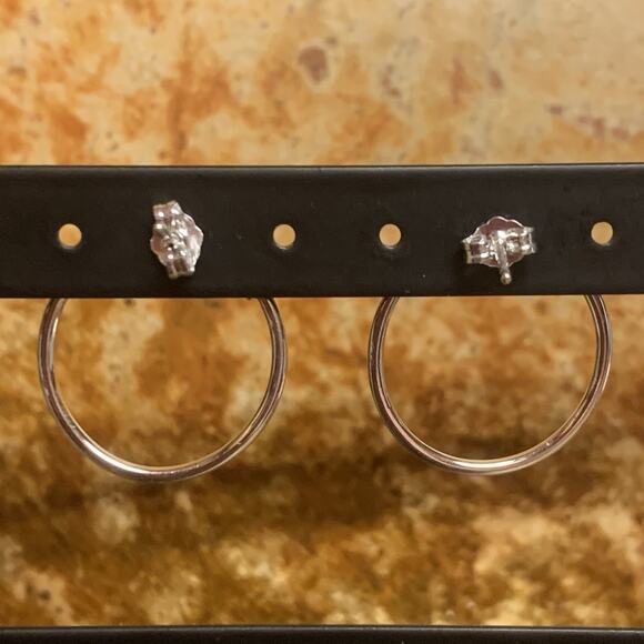 Sterling Silver and CZ Swirl Earrings by CC - Picture 7 of 7